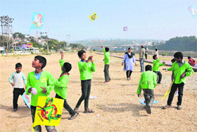 Children enjoy kite flying during an awareness programme organised by an NGO, Childline, in Jammu on Saturday.
