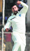 Pragyan Ojha celebrates the dismissal of England's Kevin Pietersen on Day 3 of the first cricket test match at Motera in Ahmedabad on Saturday.  PTI