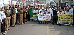 A traffic awareness rally being flagged off at the Hanuman Chowk in Bathinda on Sunday