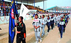 Participants take part in the marchpast ceremony