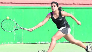 A player in action during the CLTA-AITA Chandigarh Open Men and Women Tennis Tournament at the CLTA Court in Chandigarh on Sunday.
