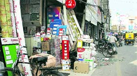 Shopkeepers encroach upon spaces in front of their units at Phagwara Gate in Jalandhar.