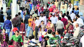 Scores of teachers come out of the centre where they appeared for the CBSE eligibility test in Jalandhar on Sunday.