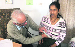 Dr Sunil Sanon checks up Reena, who has just returned after a heart surgery in New Delhi