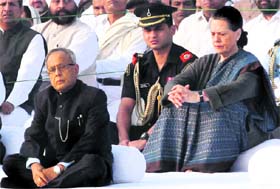 President Pranab Mukherjee and Congress president Sonia Gandhi after paying tributes to late PM Indira Gandhi on her 95th birth anniversary in New Delhi on Monday.