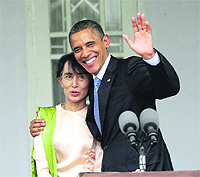 US President Barack Obama with Aung San Suu Kyi after addressing members of the media at her residence in Yangon. 