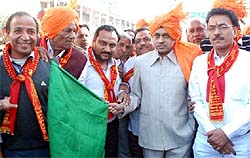 IG (Counter Intelligence) Dr Jitendra Jain (left) flags off the Gopashtami procession that began from Gandhi Market in the city; a tableau taken out on the occasion