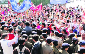 ASHA workers hold a protest in front of the Secretariat in Dehradun. They are demanding the payment of the pending arrears.