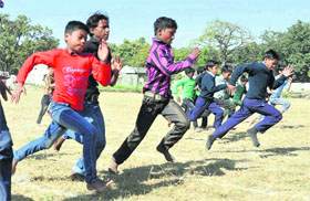 Underprivileged children participate in a sports day organised by the Ankit Welfare Society in Dehradun on Tuesday.
