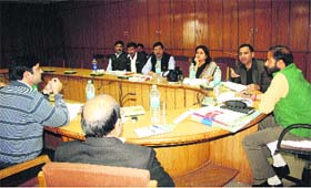 Urban Development Minister Pritam Singh Panwar chairs a review meeting of his department in Dehradun on Tuesday