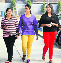 College girls look trendy donning bright colour trousers in Jalandhar