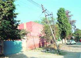 The electricity pole which got tilted on the Mall Road