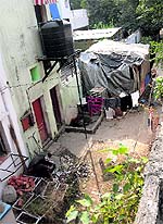 A tent is pitched on the service lane outside the residences of two former Punjab DGPs in Sector 8, Chandigarh