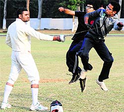 Students perform martial arts during the annual sports day function at Government College, Sector 11, on Wednesday