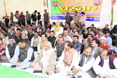 BJP leaders and workers hold a dharna against the policies of the Union Government in Dehradun on Wednesday.