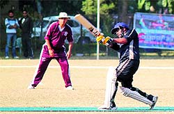 Players in action during the All India Vice-Chancellors T-20 Cricket Cup 2012 in Jammu on Wednesday