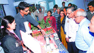 Students explain a model to visitors at a science exhibition in Government College, Bhiwani, on Thursday.