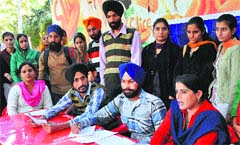 Members of Jammu and Kashmir Punjabi Forum address a press conference at Jammu University on Thursday. Tribune photo: Inderjeet Singh