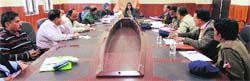 Reasi Deputy Commissioner Nirmal Sharma reviews pace of road projects in Reasi on Thursday. A Tribune photograph
