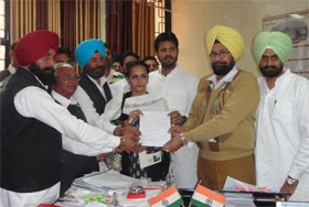 District Congress leaders hand over a memorandum regarding the demarcation of village wards to Muktsar ADC NS Bath at his office on Thursday.