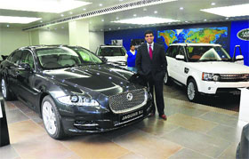 Rishi Dada next to Jaguar XJ
