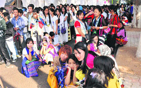 Students wait for KK Sharma, Adviser to the UT Administrator, to flag off the carnival parade at Sector 10 in Chandigarh on Friday.
