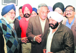 Chief Minister Vijay Bahuguna meets a delegation of Gurdwara Shri Guru Singh Sabha in Dehradun on Friday.
