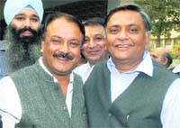 Ravi Mahendru along his mentor MLA Manoranjan Kalia poses for a picture after being declared district president of the BJP in Jalandhar on Friday. Tribune Photo: Malkiat Singh