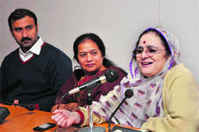 Noted Dogri poet Padma Sachdev addresses a gathering at the Seminar Hall of the Environmental Science Department, University of Jammu, on Friday.