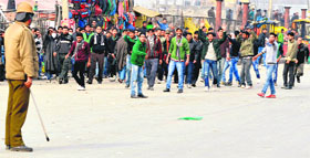 People during a protest in Srinagar on Friday.