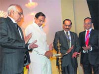Finance Minister P. Chidambaram lights the lamp to inaugurate Bancon 2012 in Pune on Saturday. Bank of Maharashtra chairman & MD Narendra Singh and Indian Banks Association (IBA) chairman and Punjab National Bank CMD K.R. Kamath are also seen