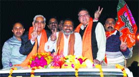 Parveen Bansal (centre) takes part in a victory procession after being elected the district BJP chief on Saturday.