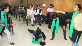 Members of an NGO stage a play to mark National Epilepsy Day at the Dayanand Medical College and Hospital.