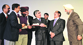 Chief Justice of Punjab & Haryana High Court AK Sikri (third from right) and SC judge Justice SS Nijjar (second from right) share a light moment at a function on Saturday.