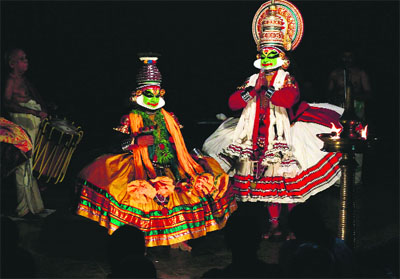 Kathakali dancers perform during the annual temple festival at Tripunithura, in Kerala. Kathakali, an elaborate classical dance-drama depicting stories from the Hindu mythology, combines literature, music, painting, acting and dance.