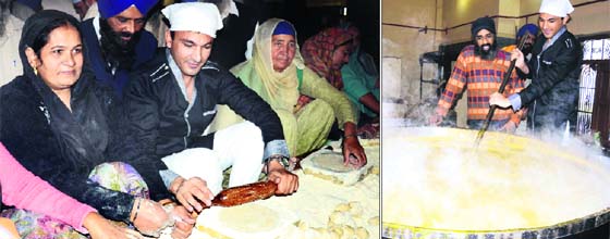Chef Vikas Khanna cooks langar at the Golden Temple in Amritsar on Sunday. 