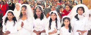 A prayer being held ahead of Christmas celebrations at St Francis Church in Dehradun on Sunday. 