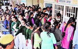 Students of various schools line up for a medical check-up for driving licences at the Mini-Secretariat in Karnal on Saturday