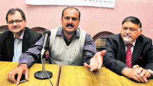 Joint action committee members address mediapersons in Jammu on Sunday