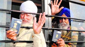 Pilgrims before leaving for Pakistan, in Amritsar on Sunday.