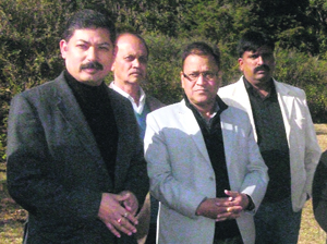 Secretary (Sports) Ajay Pradyot (in black coat) during his visit at Bhilaru in Mussoorie on Monday.