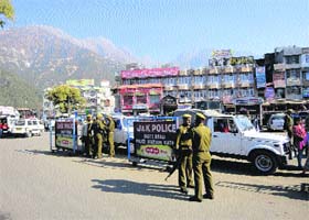 Security forces keep vigil at Katra after a hotel received an e-mail threatening terror strike to avenge Ajmal Kasabs hanging