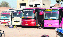 A number of buses parked in a ground close to the busy Hall Gate in Amritsar.