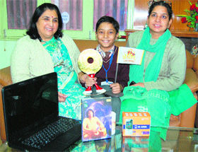 DAV Public School student Agam Shingari shows Pogo Amazing Kid Award in Amritsar.