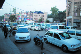 People hunt for space to park their vehicles near Subhash Market in Bathinda.