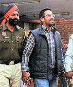 Amandeep Singh Multani, SOPU leader, comes out of a district court in Mohali on Tuesday