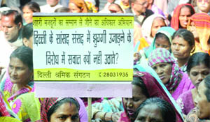 Slum dwellers hold a protest at Jantar Mantar in New Delhi on Tuesday.