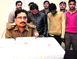 Dehradun SSP Kewal Khurana with the members of the Banti gang in Dehradun on Tuesday