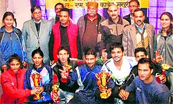 The players of DAV College, Dehradun, with the winning trophy in Mussoorie