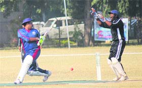 Players in action during a match of the All India Vice-Chancellors T20 Cricket Cup in Jammu on Tuesday